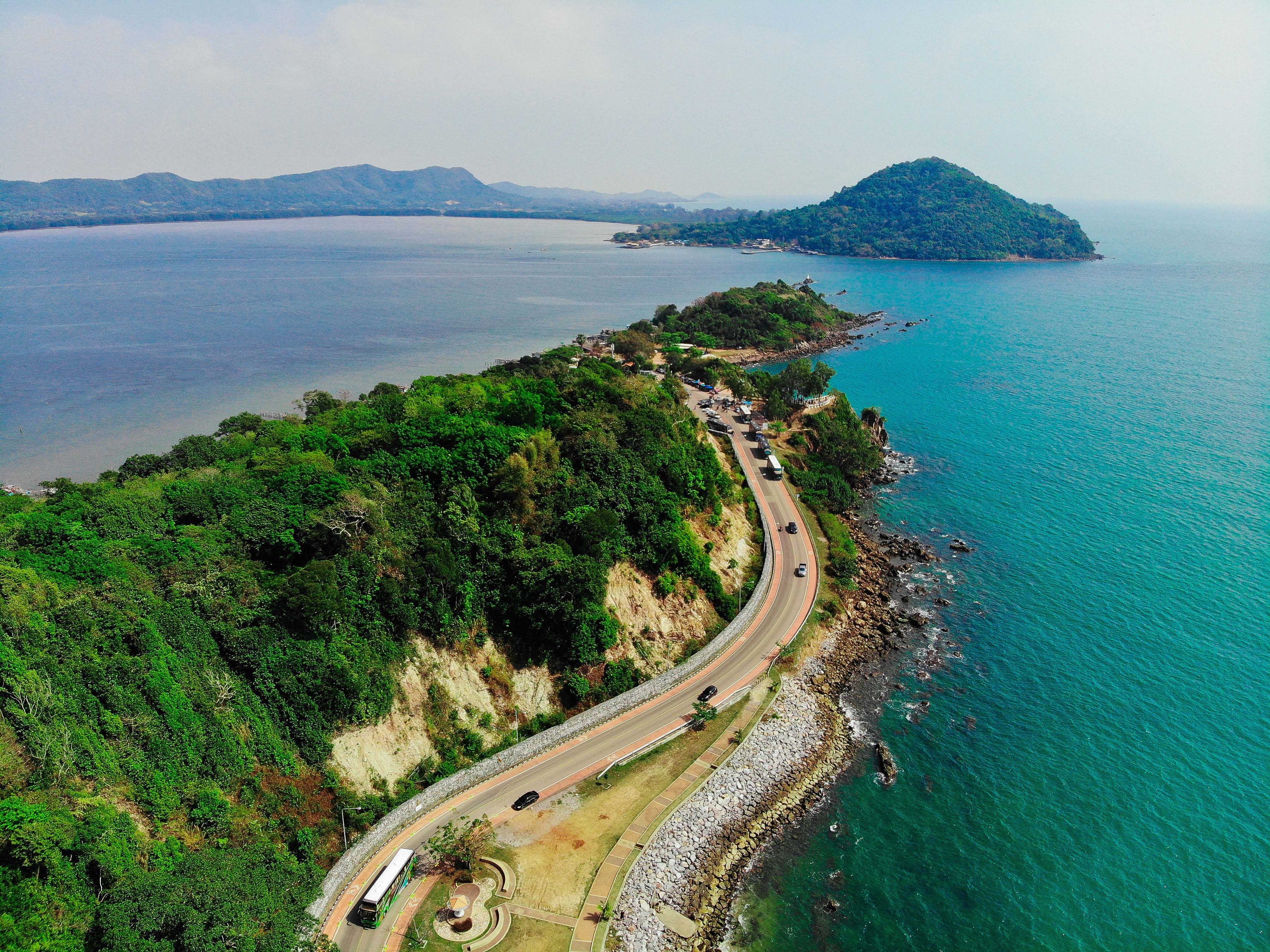 aerial shot of a coastal road