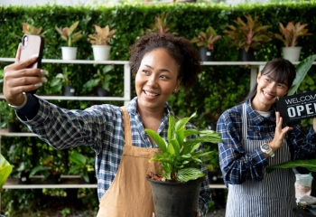 Two women entrepreneurs in a plant shop 