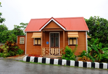Orange chattel house in Barbados