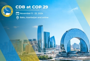  A card with CDB logo images of skyscrapers and the dates of COP29 November 11-22, 2024 